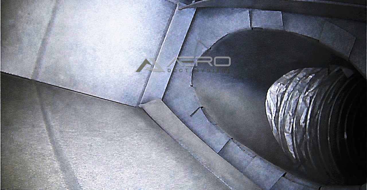 A reference showing the same duct clear of debris